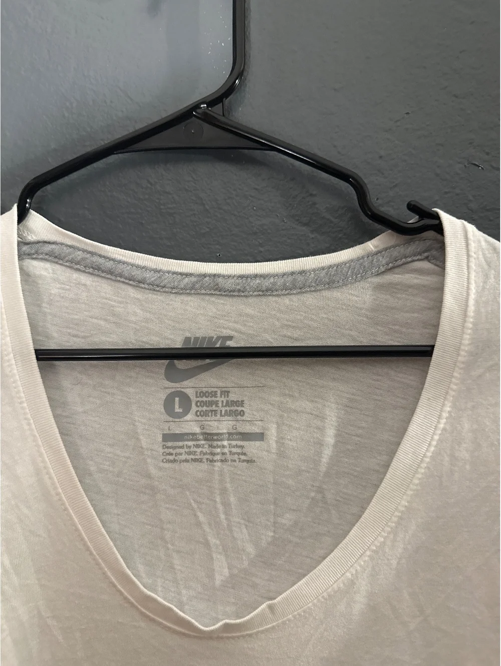Nike White V-Neck Loose Fit T-Shirt with Leopard Print Logo